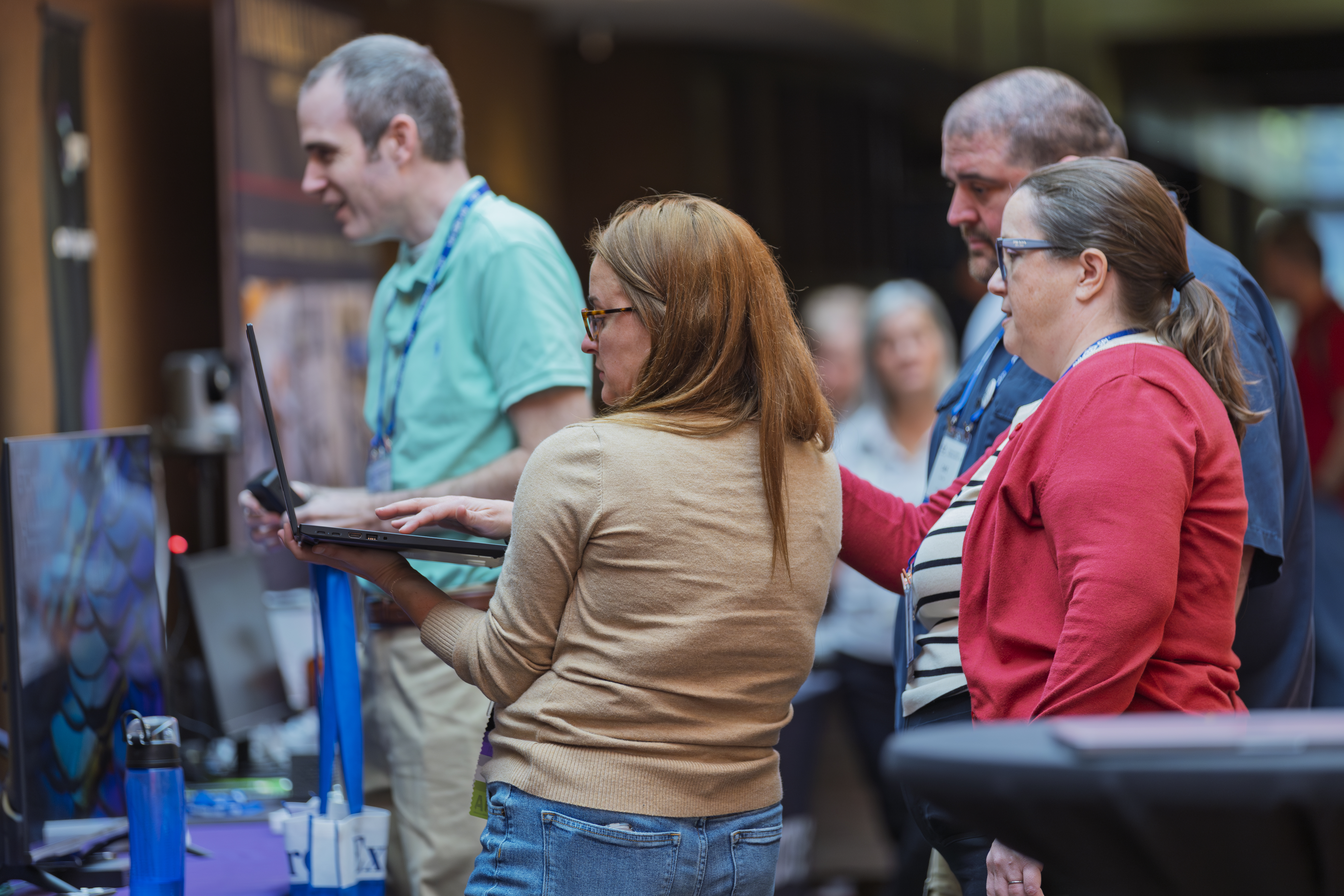 Image of people interacting at an event